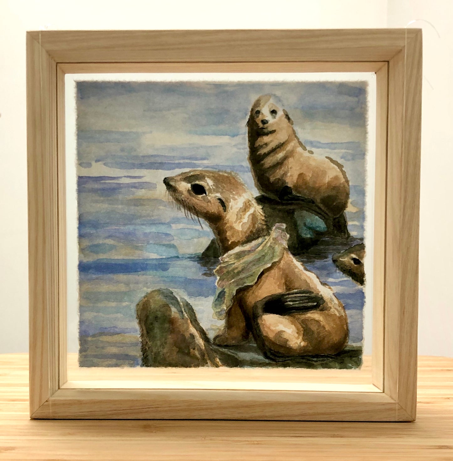 Framed with glass on both sides as the ink painting can be seen in reverse through the rice paper.